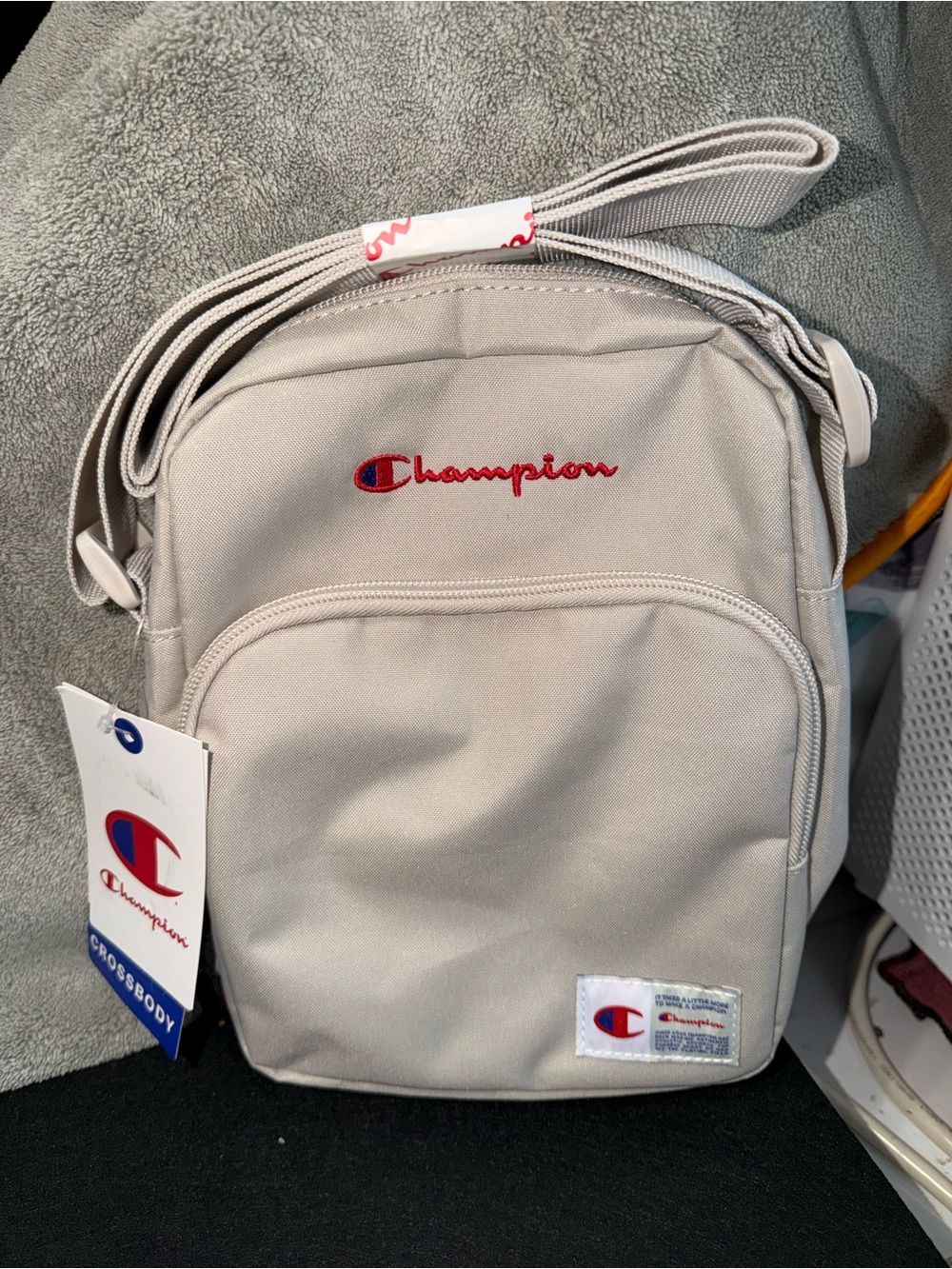 Champion Taupe Crossbody Bag with Red Logo